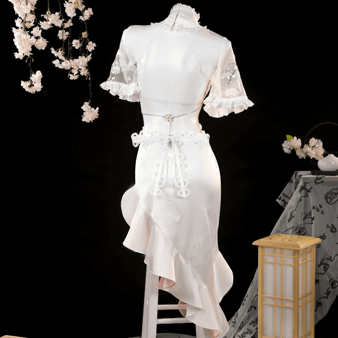 White lace dress on a mannequin with cherry blossoms and a small table in the background Rolecosplay NIKKE Feast on Peachland Dorothy Cheongsam Cosplay Costume