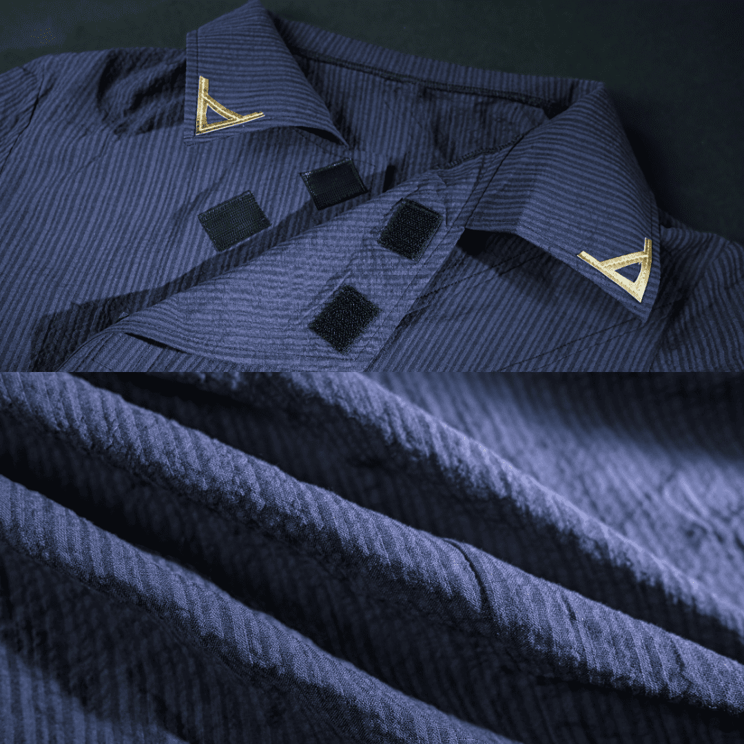 Folded navy blue shirt with gold accents on a dark background Rolecosplay LOL Aphelios Cosplay Costume