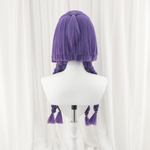 Purple wig on a mannequin head against a white background
