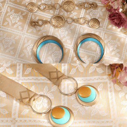 Gold and turquoise jewelry set on a decorative fabric background Rolecosplay Wuthering Waves Iuno Cosplay Costume